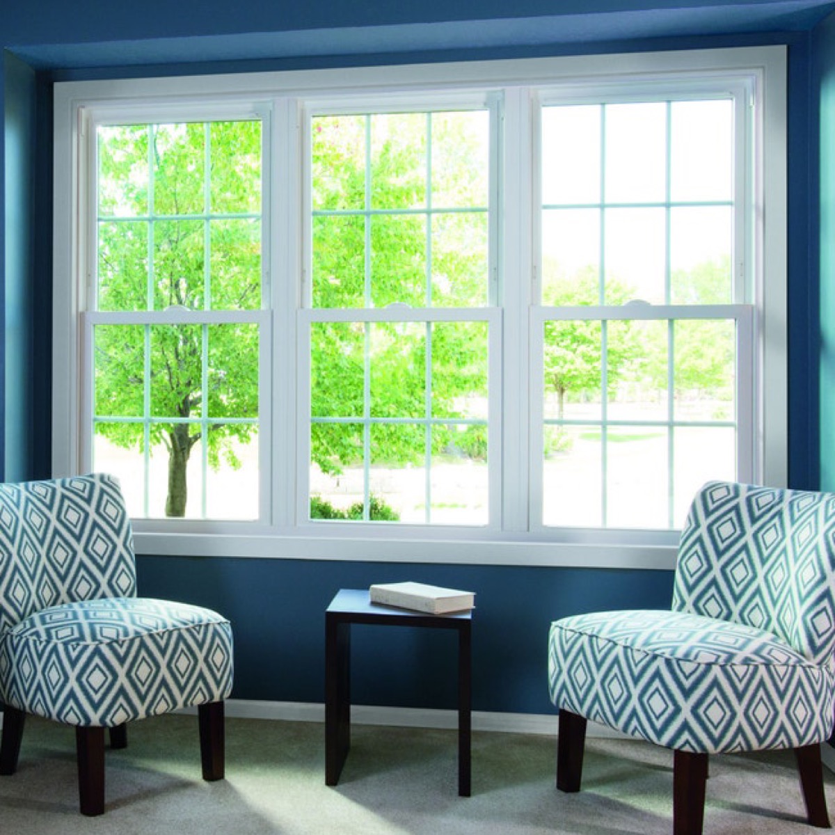 Bright living room with new double-hung replacement windows on a Cincinnati home