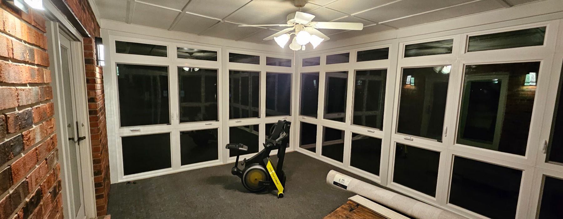 Sunroom with new energy-efficient windows and rebuilt deck in Fairfield, OH